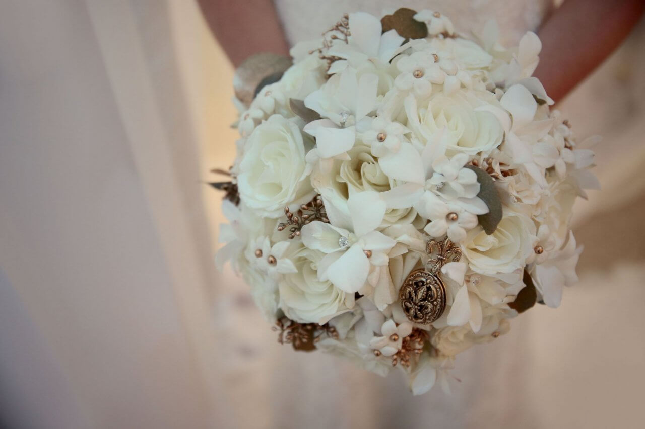 white bouquet with simple gold vintage details