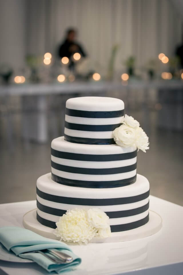 black and white striped three tier wedding cake