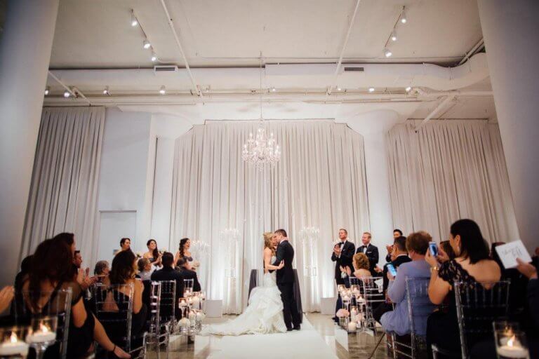 White wedding ceremony draping and orchids | Chez | Chicago Wedding Venue