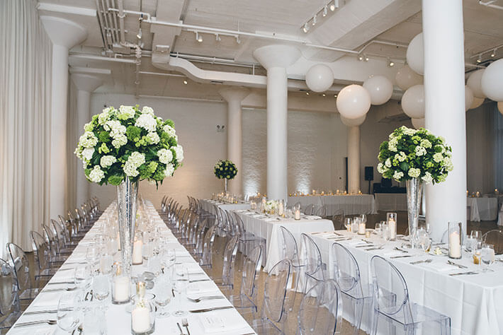 white rectangular tables wedding reception setup