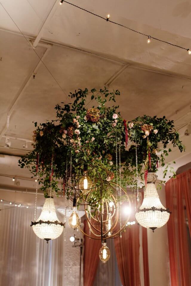 hanging greenery with rustic chandeliers
