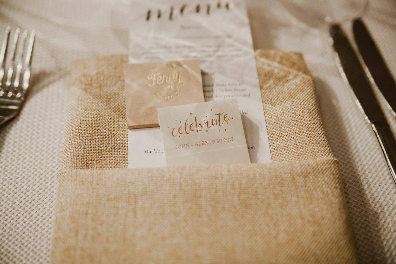 burlap wedding menue with white and tan notes