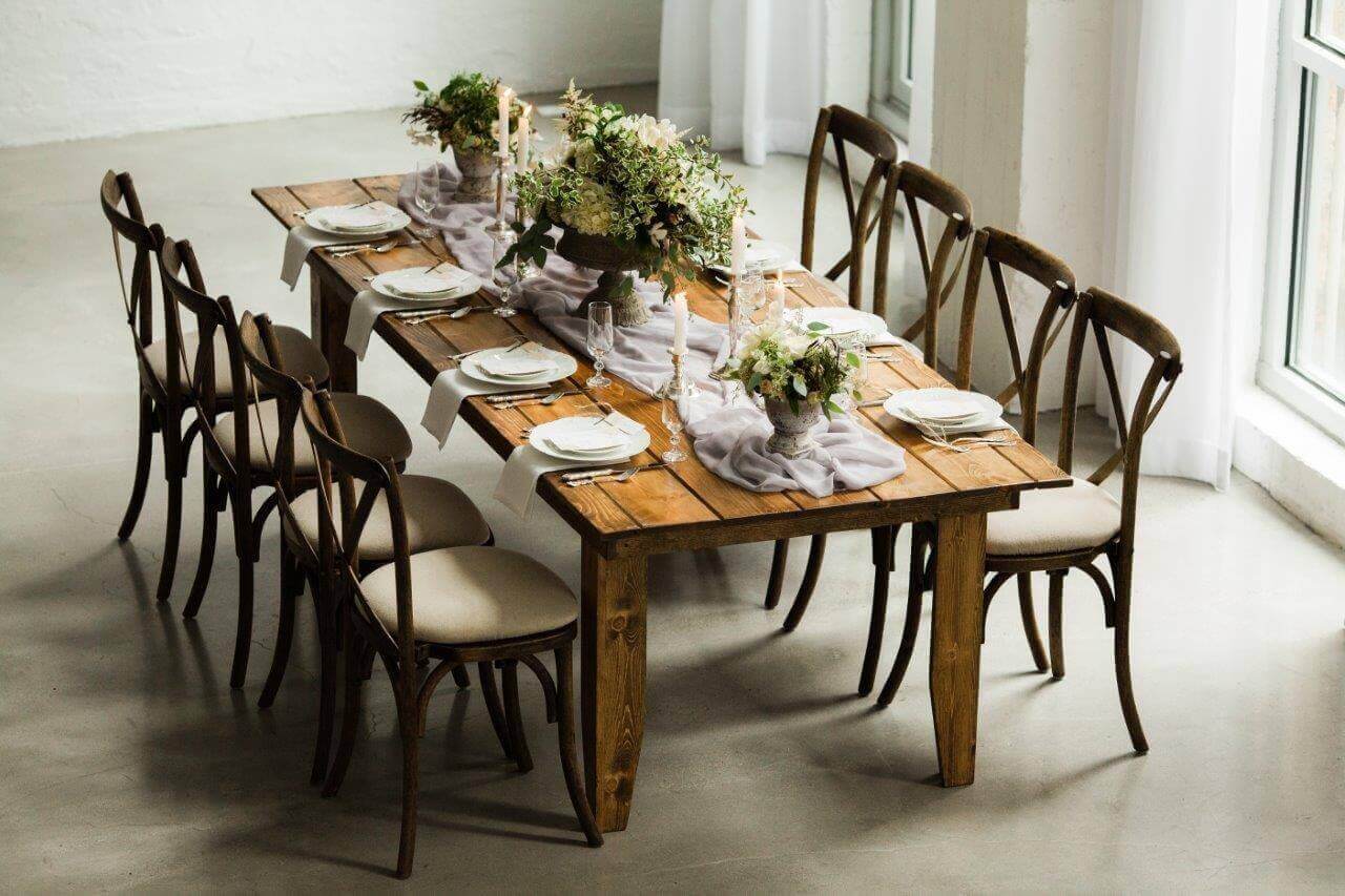 wooden farm table in modern white space