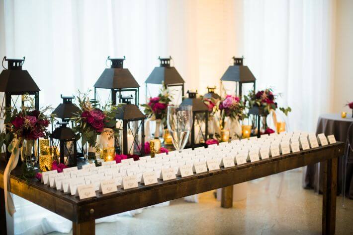 rusic escort card table with wooden lamps