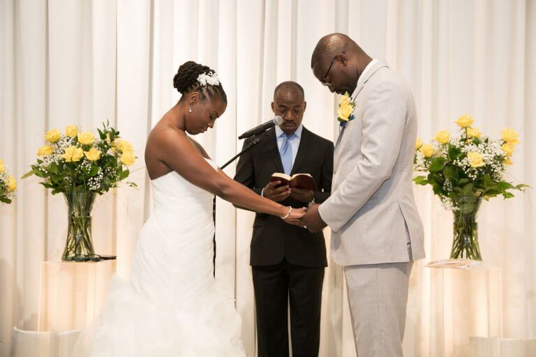 white ceremony with yellow roses