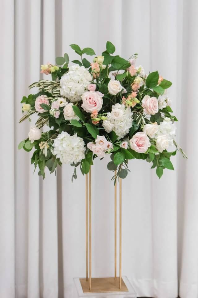 floral wedding arrangement pink white and green