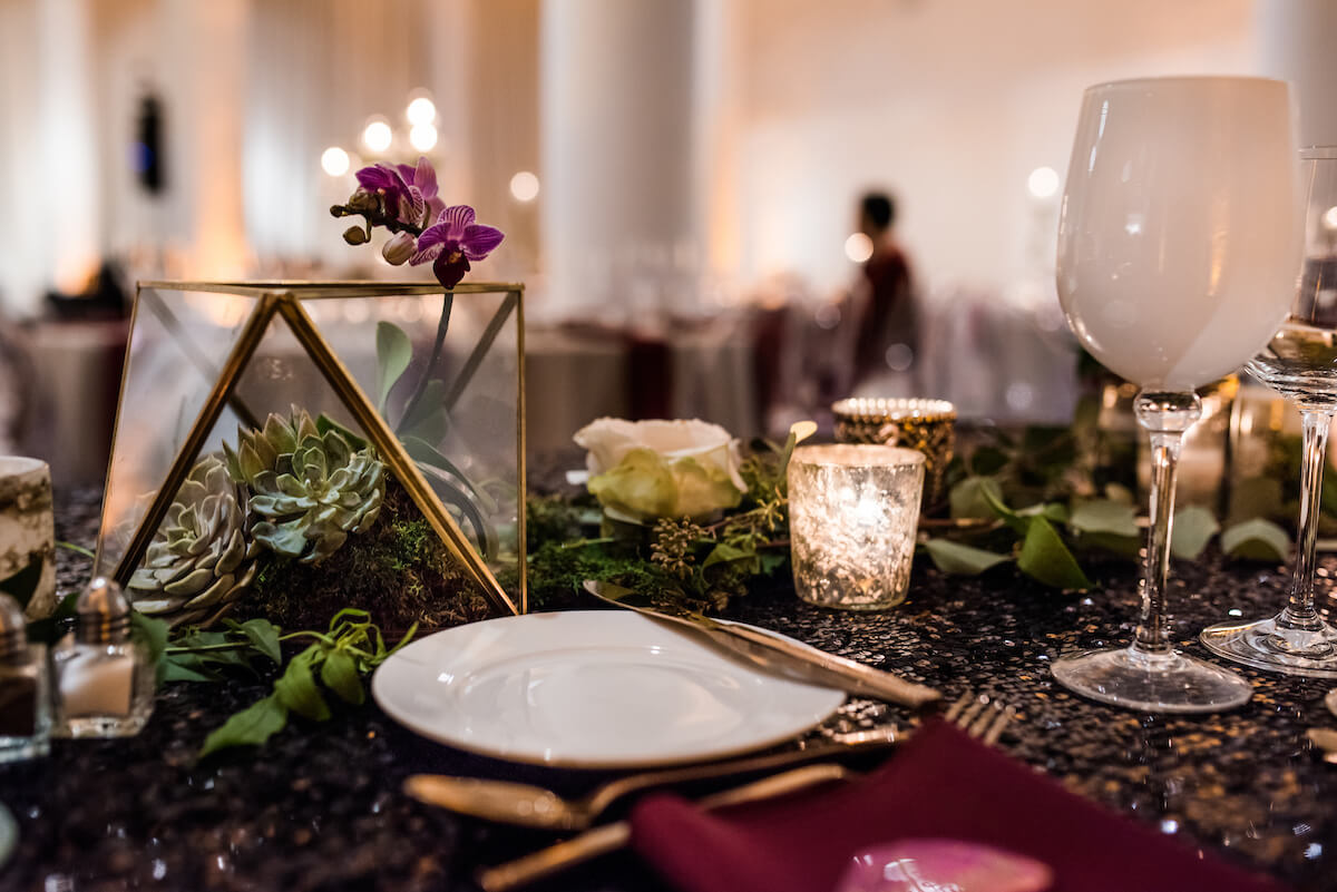 gold decorations on black sequin table