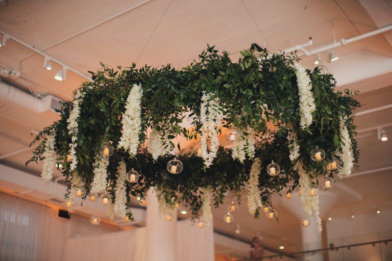 Married under Hanging Plants and Disco Ball in New Orleans  Greenery  wedding decor, Hanging flowers wedding, Candlelight wedding ceremony